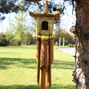 Square seagrass bird box with chimes, perfect for home decor and gifting.