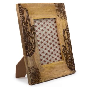Large black mango wood picture frame featuring a Hamsa design.
