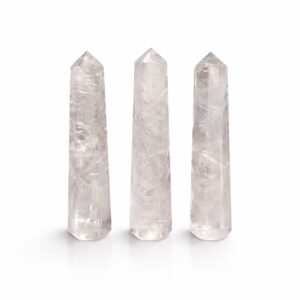 Clear Quartz Six Face Obelisk Point with polished finish and light-catching tones.
