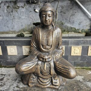 Large antique gold Thai Buddha statue, perfect for home decor and meditation.