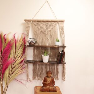 Handmade brown macrame hanging shelves for stylish home decor.