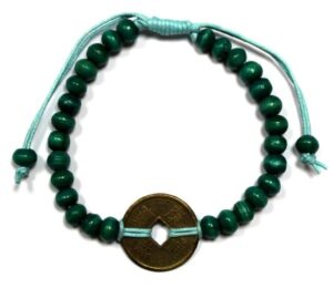 Green Good Luck Feng Shui Bracelet with wooden beads and coins of fortune.