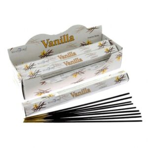 Hexagonal vanilla incense sticks in a stylish holder, perfect for relaxation.