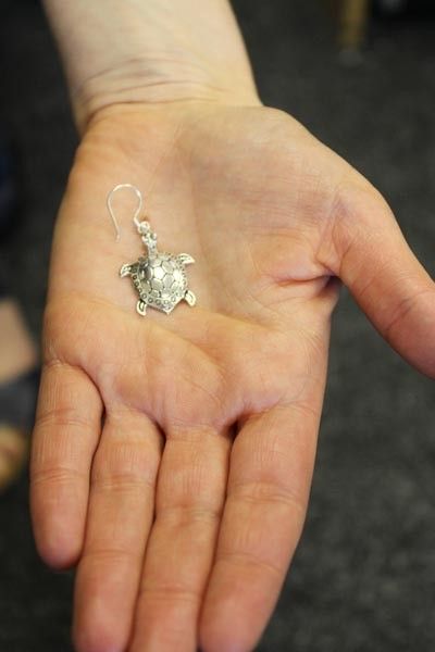Stylish 925 sterling silver earrings shaped like turtles, perfect for any occasion.