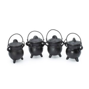 Set of four extra small cast iron cauldrons, perfect for incense or decorative use.