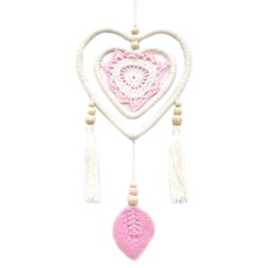 Handmade medium pink heart dream catcher from Bali, featuring rattan and wooden beads.