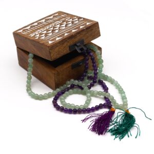 108 bead mala made of amethyst gemstones, ideal for meditation and mindfulness practices.