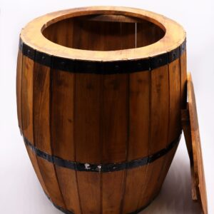 Natural wood beer barrel table with black metal-style bands.