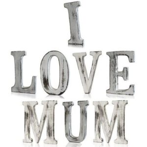 Handmade white wooden letters spelling 'I LOVE MUM' for home decor