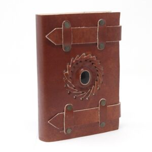 Black onyx leather notebook with unique buckles and metal clasps.