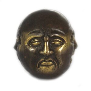 Brass Four Face Buddha ornament for home decor and relaxation.