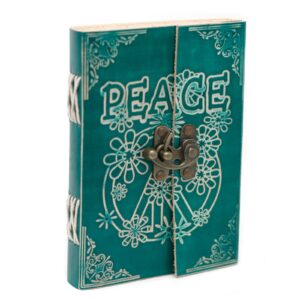 Leather green notebook with lock and unique detailing for journaling.