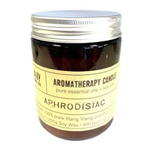 Amber glass jar aromatherapy candle with natural soy wax and essential oils.