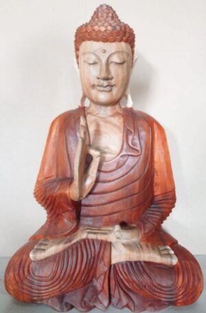 Hand carved Buddha statue showcasing intricate details and natural wood finish.