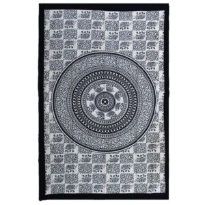 Mono elephant mandala cotton bedspread and wall hanging in a serene setting.