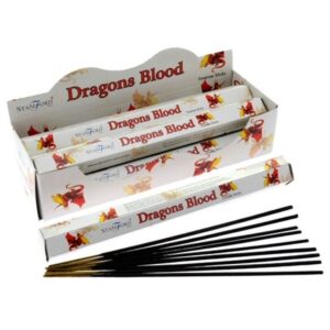Hexagonal incense sticks in a stylish holder, creating a calming atmosphere.