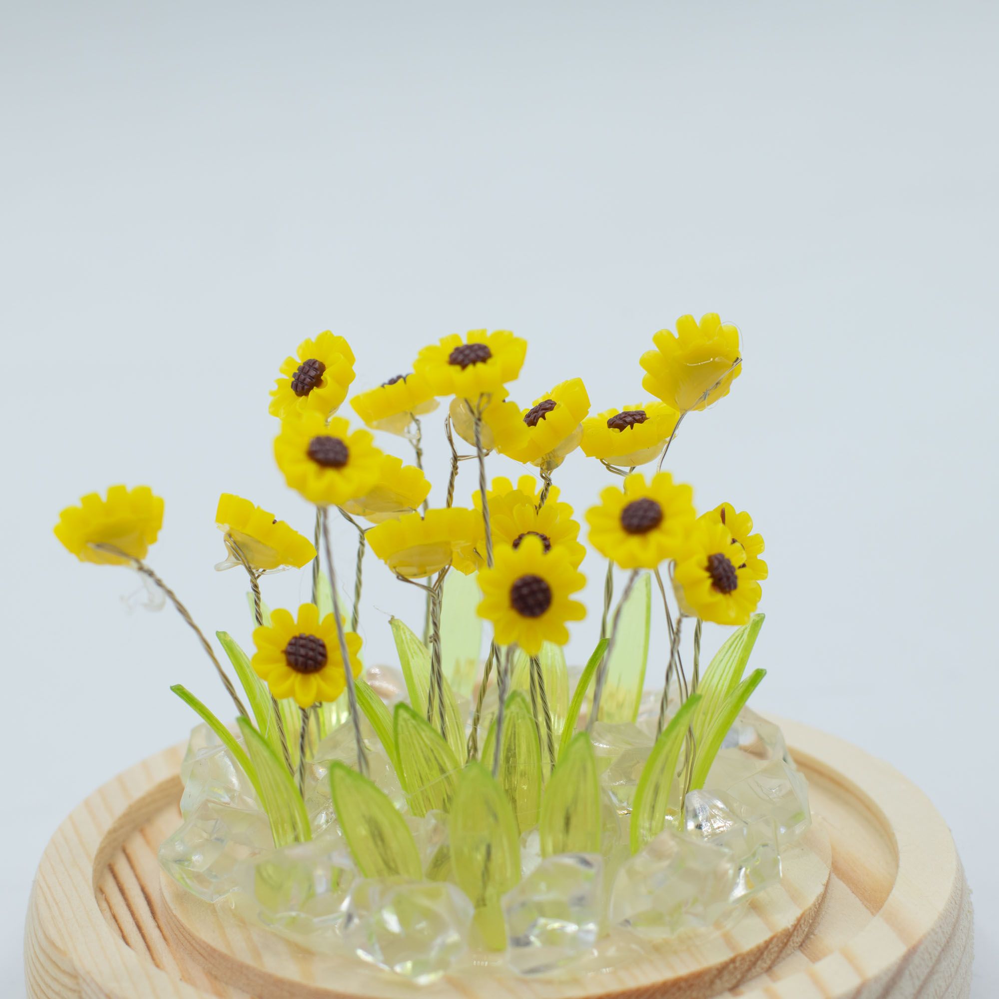Floral Glow Garden Dome - 20 Sunflower - LED USB 6 LED garden dome featuring sunflowers under a clear glass dome with wooden base.
