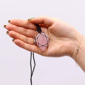 Handcrafted rose quartz teardrop pendant with adjustable string for a custom fit.