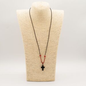 Black agate cross pendant on a cord necklace, perfect for everyday wear.
