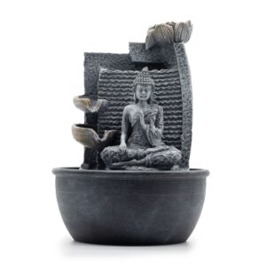 Tabletop water feature with Buddha and lotus flower cascading pots.