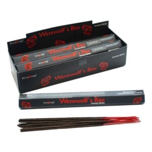Werewolf's Bite Incense Sticks in a decorative holder, releasing fragrant smoke.