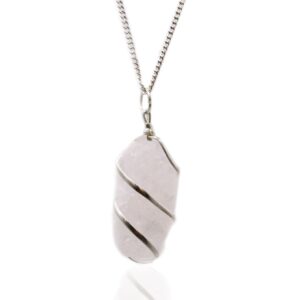 Cascade wrapped rough rose quartz necklace with delicate pink hues.