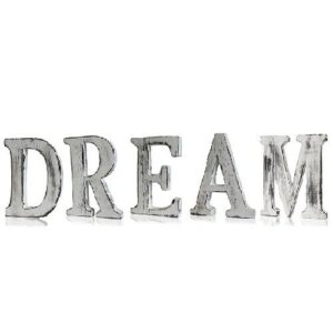 Handmade white wooden letter 'DREAM' with a rustic finish, perfect for home decor.