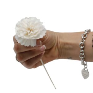 Handcrafted sola wood diffuser flower in a natural setting.