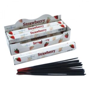Hexagonal incense sticks in a stylish holder, perfect for creating a calming atmosphere.