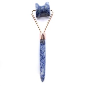 Sodalite gemstone jawline roller with bold blue and white marbling.