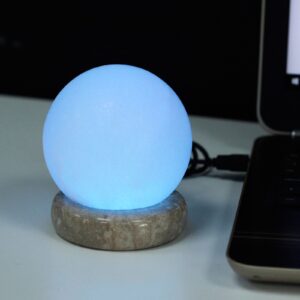 Multicolour USB Himalayan salt lamp with light fitting and USB connector.