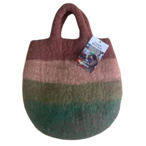 Felted bag featuring a whimsical mushroom garden design.