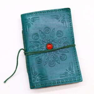 Assorted Gemstone Chakra Notebooks in vibrant designs, perfect for mindful writing.