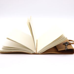 Oiled tan leather journal with key, featuring 200 pages and a sophisticated design.