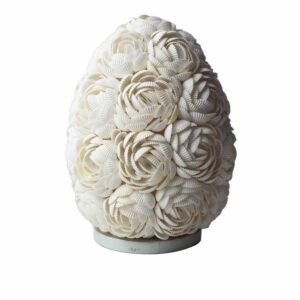 Handcrafted Boho Sea Shell Lamp with warm glow, perfect for coastal decor.