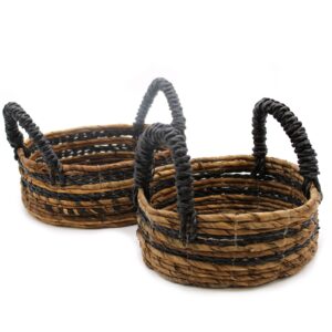 Set of two banana leaf and hitam raffia baskets for stylish storage.