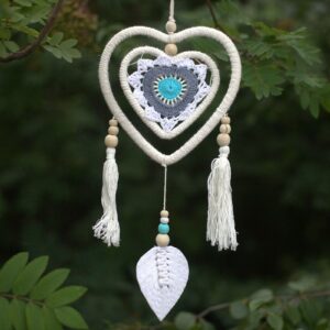 Handmade medium blue heart in heart dream catcher from Bali.