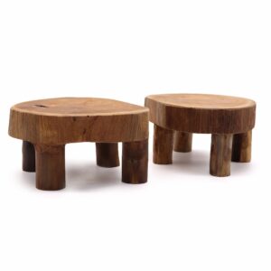 Stylish low teak pad display showcasing items with rustic elegance.