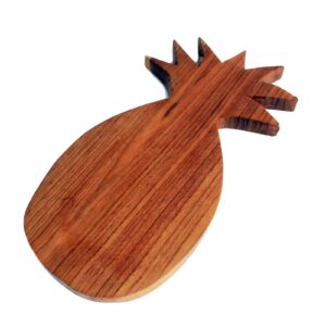 Hand carved pineapple shaped chopping board made from teak wood.