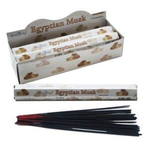 Stamford Hexagonal Incense Sticks in a stylish holder, emitting a calming aroma.