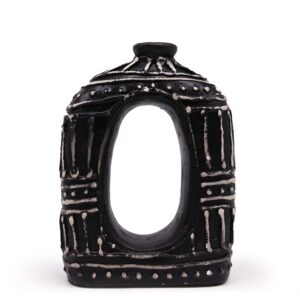 Chocolate oval donut shaped ceramic vase, perfect for home decor.