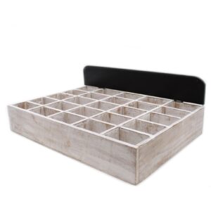 Whitewashed wooden tray with 25 compartments for organising small items.