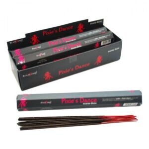 Pixie's Dance Incense Sticks in a decorative holder, releasing calming fragrance.