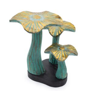 Greenwashed small golden mushroom sculpture with a natural earthy feel.