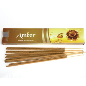 Hand rolled Vedic incense sticks with rich amber fragrance in a decorative box.